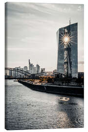 Canvas print  ECB in Front of the Skyline With Sun Shining Through the Building - Jan Wehnert