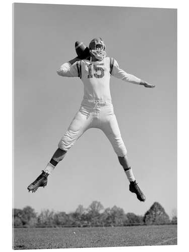 Acrylic print Quarterback Jumping and Throwing Football