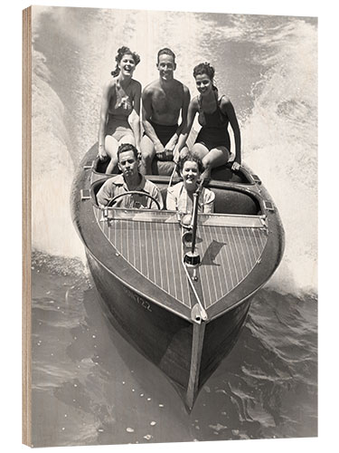 Tableau en bois Couples Sitting on a Soeedboat
