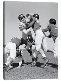 Obraz na płótnie  Group Tackle in a Football Game