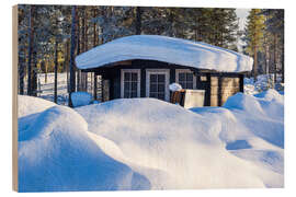 Cuadro de madera Wooden Cabin Under the Snow in Kuusamo, Finland