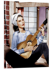 Obraz na PCV Audrey Hepburn plays the guitar in "Breakfast at Tiffany's"