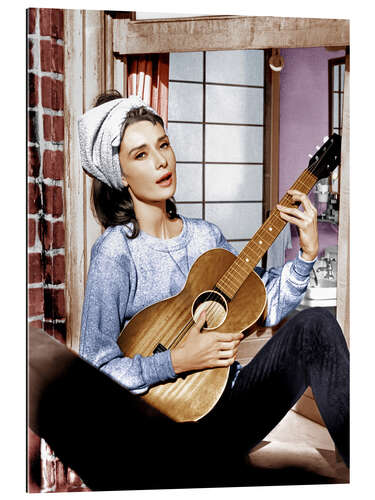 Galleriataulu Audrey Hepburn plays the guitar in "Breakfast at Tiffany's"