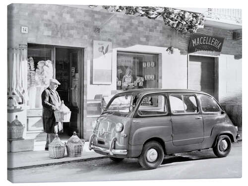 Leinwandbild Fiat 600 Multipla vor einem Geschäft