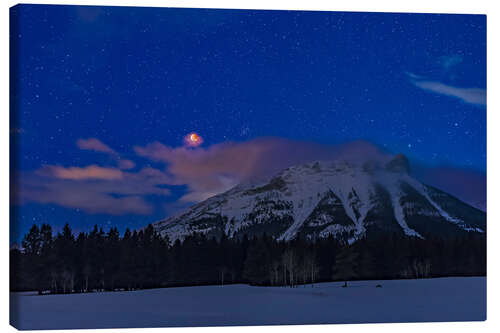 Quadro em tela Moon total eclipse over the Canadian Rocky Mountains in Alberta, Canada