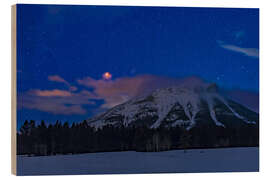 Wood print Moon total eclipse over the Canadian Rocky Mountains in Alberta, Canada