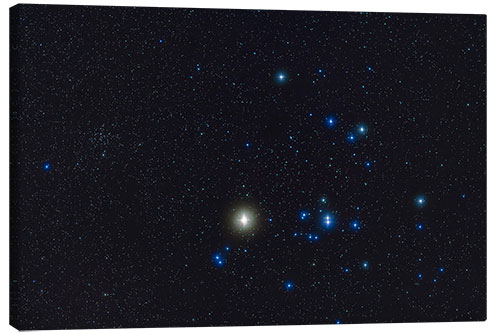 Canvas print The Hyades star cluster and bright yellow Aldebaran star