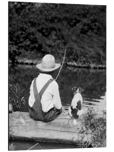 Stampa su alluminio Farm boy with straw hat fishing with his dog