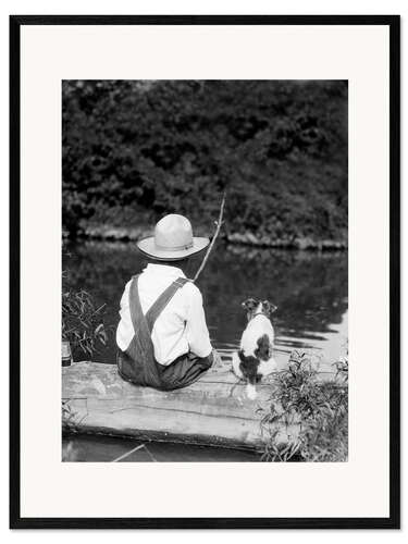 Impresión de arte enmarcada Farm boy with straw hat fishing with his dog