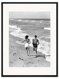 Gerahmter Kunstdruck Pärchen beim Joggen an der Brandung des Ozeans, 1930er