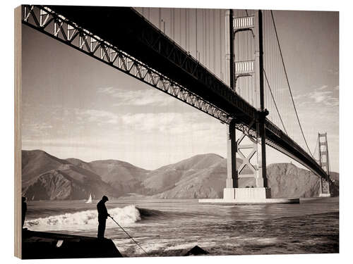 Wood print 1940s man fishing underneath Golden Gate Bridge, San Francisco