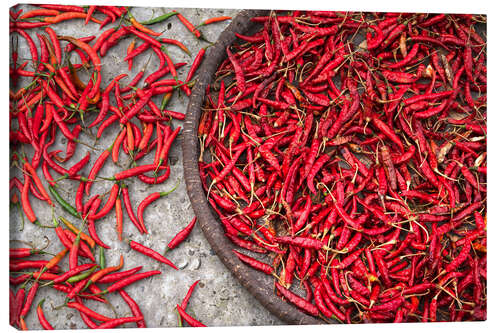 Canvas print Nepal, drying peppers on the sidewalk