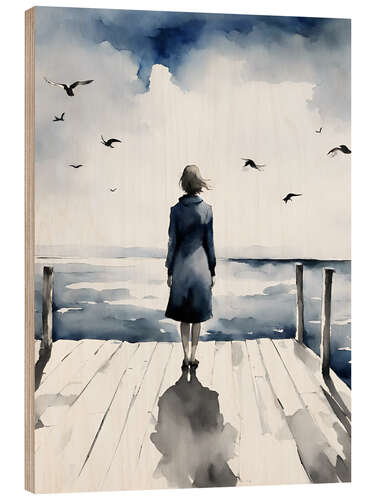 Hout print Woman on jetty looking out to sea