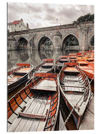 Galleriataulu Boats moored on river bank