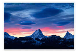 Poster Lenticular clouds during sunrise behind Schreckhorn