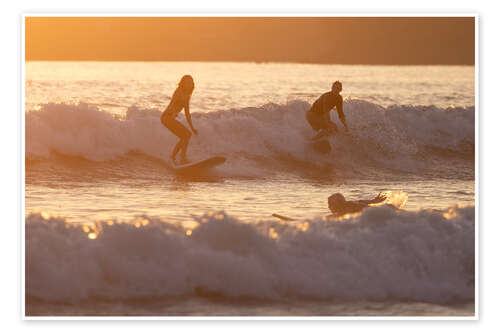 Poster Surfers backlit in Weligama Bay, Sri Lanka