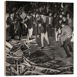Obraz na drewnie Concert-goers demolish the seats at Rolling Stones concert, Zurich, 1967