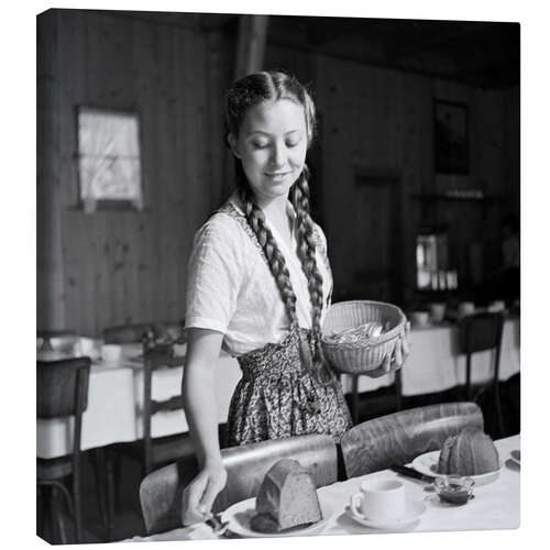 Obraz na płótnie Swiss girl sets the table for breakfast, 1943