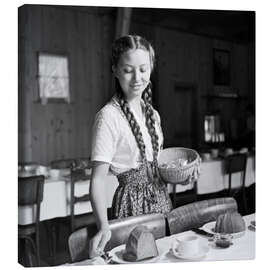 Obraz na płótnie Swiss girl sets the table for breakfast, 1943