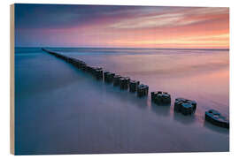 Obraz na drewnie Pier on the Baltic Sea at sunrise