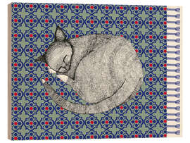 Cuadro de madera Sleeping cat on blue carpet