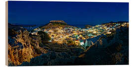 Trätavla Illuminated town of Lindos with Acropolis at sunset - Michael Rucker
