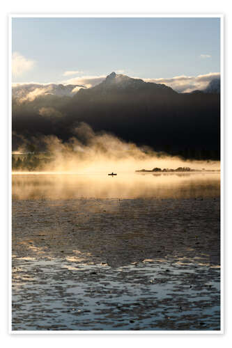 Póster Fishing Boat in Morning Mist with Mountain Panorama