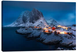 Canvas-taulu Snow-covered fishing village on the Lofoten at night