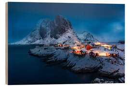 Stampa su legno Snow-covered fishing village on the Lofoten at night
