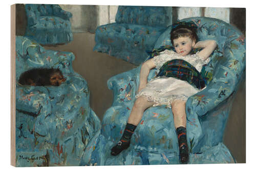 Trätavla Kleines Mädchen in einem blauen Sessel