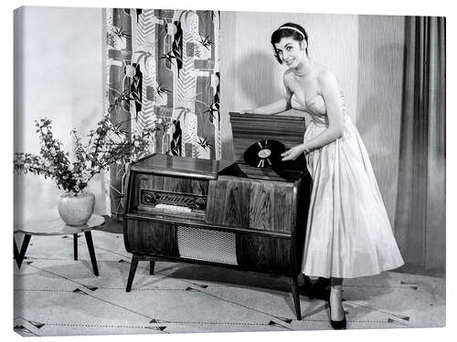 Canvas print Woman posing with record player, 1955