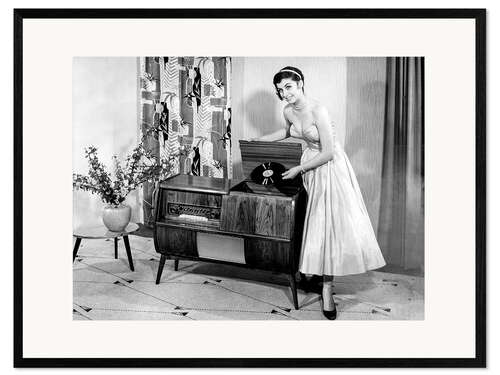 Framed art print Woman posing with record player, 1955