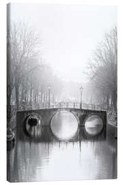 Canvas print Misty morning over a historic Amsterdam canal bridge - George Pachantouris
