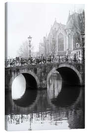 Canvas print Bridge on a foggy morning in Amsterdam - George Pachantouris