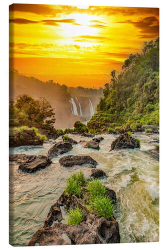 Canvas print Iguazu Falls in the sunset light