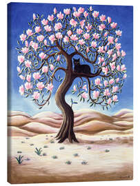 Leinwandbild Schwarze Katze auf einem Magnolienbaum - Liz Wright