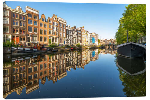 Canvas print Dutch architecture in Amsterdam on a sunny morning