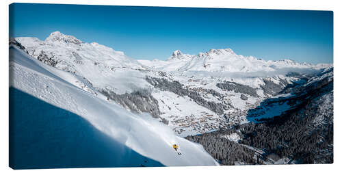 Canvas print Deep snow skiers in the mountains of Lech-Zürs am Arlberg