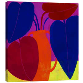 Leinwandbild Bunte Zimmerpflanze in pinkfarbenem Zimmer