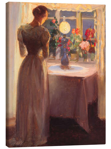 Canvas print Young girl in front of a burning lamp