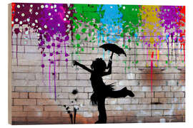 Holzbild Ein Mädchen, das im bunten Regen tanzt