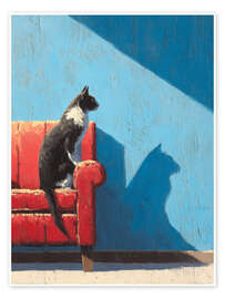 Poster Katze sitzt auf einem roten Sofa