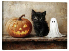 Leinwandbild Süßes schwarzes Kätzchen mit Gespenst