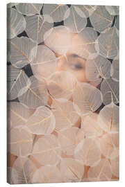 Leinwandbild Hinter Blättern