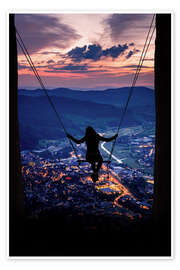 Wandbild Silhouette einer Frau auf einer Schaukel