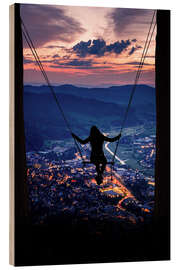 Stampa su legno Silhouette Of A Woman On A Swing