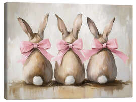 Leinwandbild Niedliche Osterhasen mit rosa Schleife - TAlex