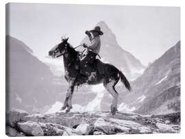 Leinwandbild Cowboy auf einem Pinto-Pony vor dem Mount Assiniboine, Kanada